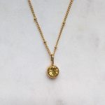 Kerek cirkóniaköves medál (több színben)