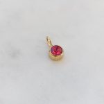 Kerek cirkóniaköves medál (több színben)