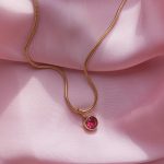 Kerek cirkóniaköves medál (több színben)