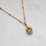 Kerek cirkóniaköves medál (több színben)