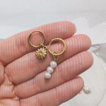 Margaret fülbevaló virággal és gyöngyökkel